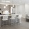 a kitchen with a table and chairs