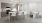 a kitchen with a table and chairs