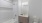 a bathroom with a tub sink and toilet
