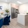 a kitchen with a table and chairs