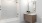 a bathroom with a tub sink and toilet