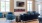 a living room with blue chairs