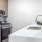 a kitchen with a sink and a microwave