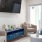 a living room with a tv and a couch