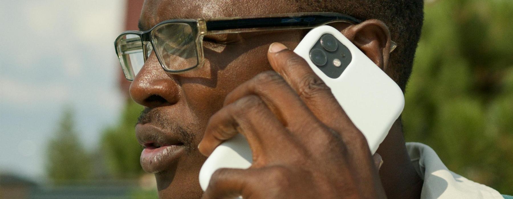 a man talking on a cell phone