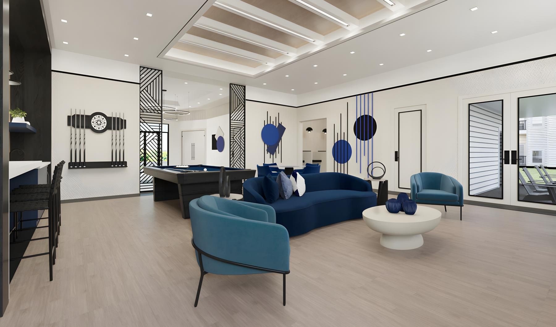 a room with blue couches and a wood floor