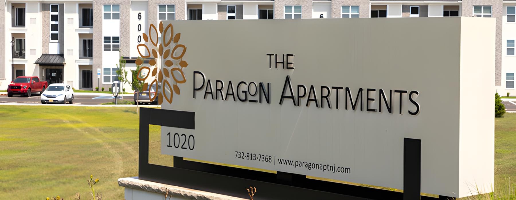 a sign in front of a building
