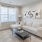 a living room with a white couch